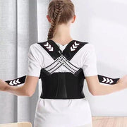 Woman wearing adjustable black posture corrector support brace for back and shoulder alignment